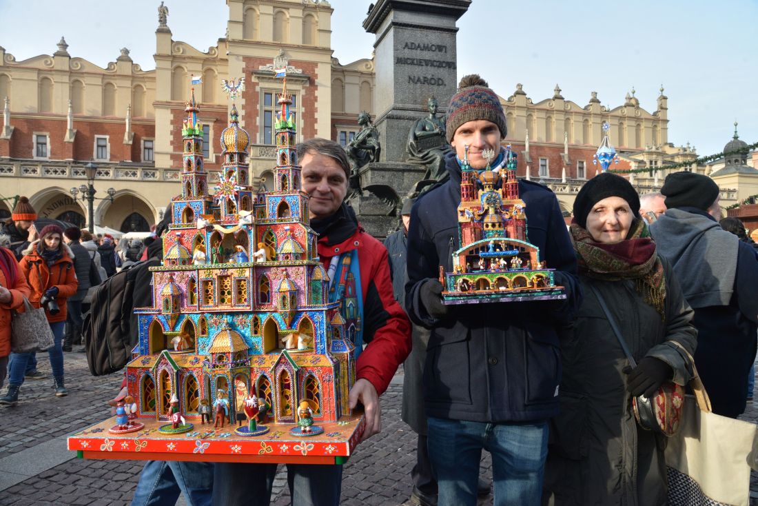 Stanisław and Andrzej Malik together with their family present nativity scenes in Kraków